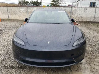 2024 Tesla Model 3 with VIN 5YJ3E1EA7RF858716, listed as a Copart auction lot 49809325 with 9,936 mi miles and Non Repairable. Bid and sale history available at DreamBid. Image 5.