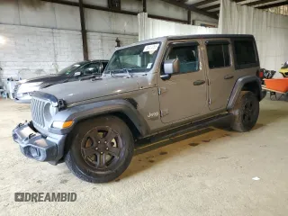 2020 Jeep Wrangler Unlimited Black and Tan with VIN 1C4HJXDG9LW331418, listed as a Copart auction lot 56414765 with 125,339 mi miles and Salvage title. Bid and sale history available at DreamBid. Image 1.