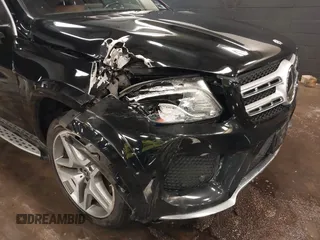 2018 Mercedes-Benz GLS 550 with VIN 4JGDF7DE1JB070994, listed as a IAAI auction lot 41676076 with 104,748 mi miles and . Bid and sale history available at DreamBid. Image 6.
