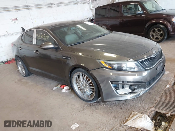 2015 Kia Optima EX with VIN 5XXGN4A73FG372426, listed as a IAAI auction lot 42630287 with 154,060 mi miles and . Bid and sale history available at DreamBid. Image 1.