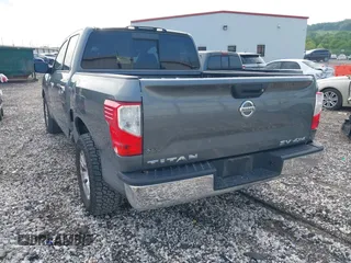 2018 Nissan Titan SV z VIN 1N6AA1EJ0JN518166, wystawiony jako IAAI lot #42124998 z przebiegiem 99 443 mil mil oraz . Historia ofert i sprzedaży dostępna na DreamBid. Obrazek 3.
