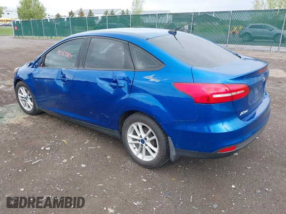 2018 Ford Focus SE z VIN 1FADP3F29JL235302, wystawiony jako IAAI lot #42262964 z przebiegiem 85 127 mil mil oraz . Historia ofert i sprzedaży dostępna na DreamBid. Obrazek 3.