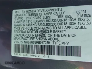 2024 Honda Odyssey EX-L with VIN 5FNRL6H63RB037259, listed as a IAAI auction lot 41665850 with 2,710 mi miles and . Bid and sale history available at DreamBid. Image 9.