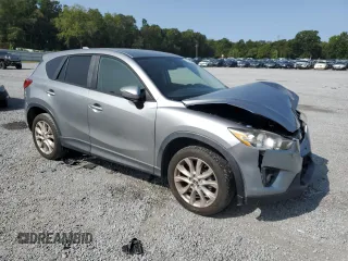 2015 Mazda CX-5 Grand Touring with VIN JM3KE4DY8F0540181, listed as a Copart auction lot 70624394 with 119,420 mi miles and Salvage Title. Bid and sale history available at carsss.com. Image 4.