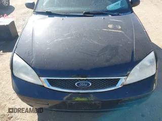 2007 Ford Focus S with VIN 1FAHP31N67W294415, listed as a IAAI auction lot 41783050 with 143,876 mi miles and . Bid and sale history available at DreamBid. Image 14.