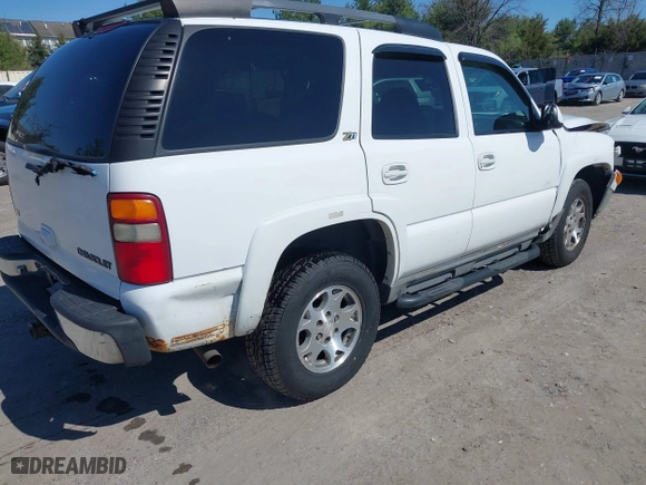 2003 Chevrolet Tahoe Z71 with VIN 1GNEK13Z63R228530, listed as a IAAI auction lot 41996750 with 220,916 mi miles. Bid and sale history available at carsss.com. Image 4.