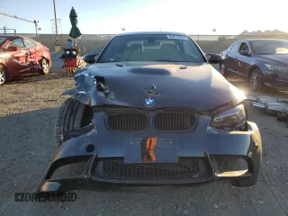 2011 BMW M3 with VIN WBSDX9C51BE584013, listed as a Copart auction lot 85279924 with 74,801 mi miles and Salvage Title. Bid and sale history available at carsss.com. Image 5.