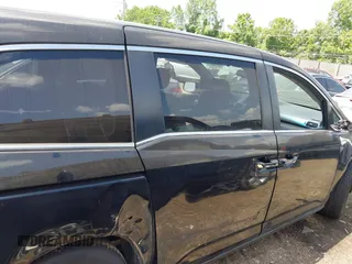 2011 Honda Odyssey EX-L with VIN 5FNRL5H62BB063125, listed as a IAAI auction lot 42562541 with 140,787 mi miles and . Bid and sale history available at DreamBid. Image 13.