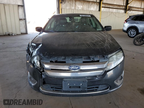 2012 Ford Fusion Hybrid с VIN 3FADP0L34CR416775, выставлен на аукционе Copart как лот 55108645 с пробегом 102 574 миль миль и Списание • Salvage title. История ставок и продаж доступна на DreamBid. Изображение 5.