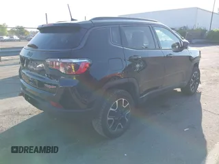 2019 Jeep Compass Trailhawk with VIN 3C4NJDDB5KT800515, listed as a IAAI auction lot 42059594 with 60,338 mi miles and . Bid and sale history available at DreamBid. Image 4.
