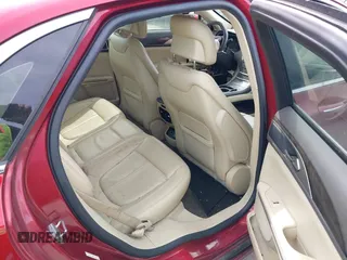 2014 Lincoln MKZ z VIN 3LN6L2G93ER802398, wystawiony jako IAAI lot #42205802 z przebiegiem 187 511 mil mil oraz . Historia ofert i sprzedaży dostępna na DreamBid. Obrazek 8.