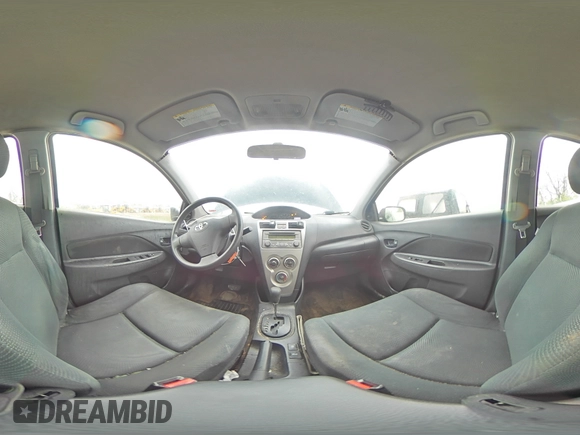 2012 Toyota Yaris with VIN JTDBT4K33CL035567, listed as a Copart auction lot 51837505 with 233,895 mi miles and Salvage Title. Bid and sale history available at DreamBid. Image 12.