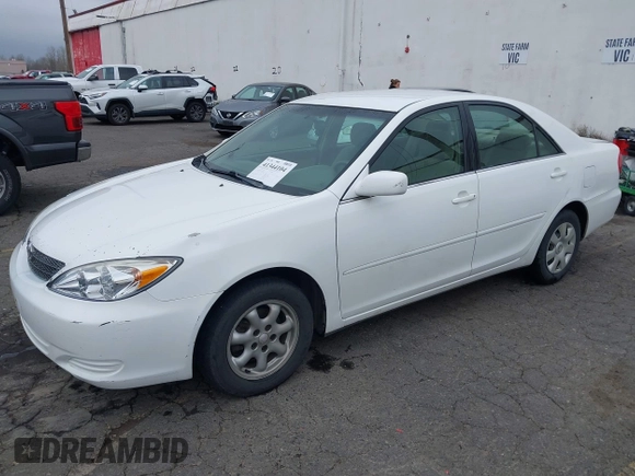 2002 Toyota Camry LE z VIN 4T1BE32K52U081479, wystawiony jako IAAI lot #41344104 z przebiegiem 243 950 mil mil oraz . Historia ofert i sprzedaży dostępna na DreamBid. Obrazek 2.