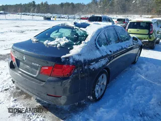 2013 BMW 5 Series 528i xDrive with VIN WBAXH5C55DDW12945, listed as a IAAI auction lot 41343124 with 137,672 mi miles and . Bid and sale history available at carsss.com. Image 4.