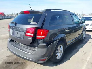 2016 Dodge Journey SXT with VIN 3C4PDDBGXGT200546, listed as a IAAI auction lot 41613264 with 117,603 mi miles and . Bid and sale history available at carsss.com. Image 4.