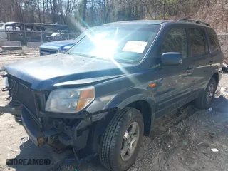 2006 Honda Pilot EX-L with VIN 2HKYF18596H500645, listed as a IAAI auction lot 41749033 with 242,599 mi miles. Bid and sale history available at carsss.com. Image 2.