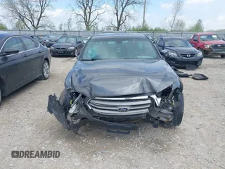 2015 Ford Taurus SEL with VIN 1FAHP2E81FG122378, listed as a IAAI auction lot 42081001 with 159,853 mi miles and . Bid and sale history available at carsss.com. Image 13.