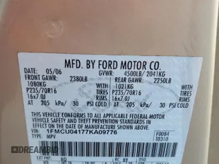 2007 Ford Escape Limited with VIN 1FMCU04177KA09776, listed as a Copart auction lot 60784535 with 175,679 mi miles and Salvage title. Bid and sale history available at DreamBid. Image 13.