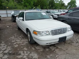1999 Ford Crown Victoria z VIN 2FAFP73W9XX109122, wystawiony jako IAAI lot #42373387 z przebiegiem 164 419 mil mil oraz . Historia ofert i sprzedaży dostępna na DreamBid. Obrazek 1.