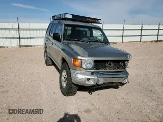 1998 Mitsubishi Montero z VIN JA4MR51R0WJ000921, wystawiony jako Copart lot #56250965 z przebiegiem 181 293 mil mil oraz Szkoda całkowita • Salvage title. Historia ofert i sprzedaży dostępna na DreamBid. Obrazek 15.