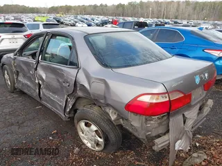 2000 Honda Accord EX z VIN 1HGCG5651YA129056, wystawiony jako IAAI lot #41532787 z przebiegiem Nie podano mil oraz . Historia ofert i sprzedaży dostępna na DreamBid. Obrazek 3.