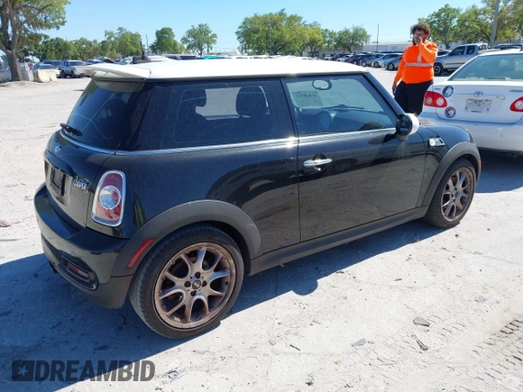 2011 MINI Hardtop S with VIN WMWSV3C5XBTY22399, listed as a IAAI auction lot 41868705 with 134,516 mi miles and . Bid and sale history available at DreamBid. Image 4.