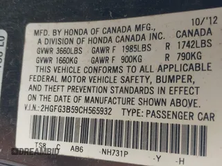 2012 Honda Civic Cpe LX with VIN 2HGFG3B59CH565932, listed as a IAAI auction lot 41949011 with 213,786 mi miles. Bid and sale history available at carsss.com. Image 9.