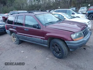 2001 Jeep Grand Cherokee Laredo with VIN 1J4GX48S41C585151, listed as a IAAI auction lot 41020660 with Not provided miles and . Bid and sale history available at DreamBid. Image 1.