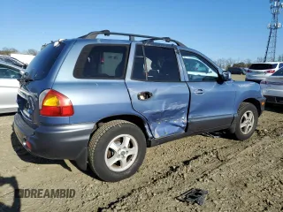 2002 Hyundai Santa Fe GLS with VIN KM8SC13D72U229643, listed as a Copart auction lot 52303635 with 71,912 mi miles and Salvage Title. Bid and sale history available at carsss.com. Image 3.