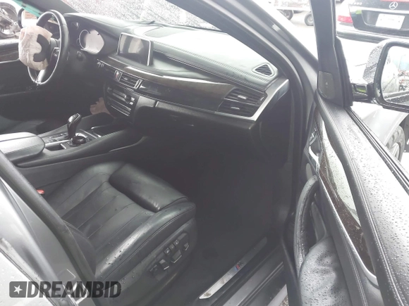 2016 BMW X6 xDrive50i with VIN 5UXKU6C59G0S82526, listed as a IAAI auction lot 41786622 with 110,796 mi miles and . Bid and sale history available at DreamBid. Image 5.