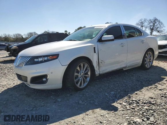 2011 Lincoln MKS EcoBoost with VIN 1LNHL9FT7BG611097, listed as a Copart auction lot 48180885 with 140,262 mi miles and Salvage title. Bid and sale history available at DreamBid. Image 1.