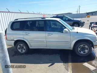 2002 Suzuki XL7 Standard z VIN JS3TX92V324125187, wystawiony jako IAAI lot #42195273 z przebiegiem 243 050 mil mil oraz . Historia ofert i sprzedaży dostępna na DreamBid. Obrazek 13.