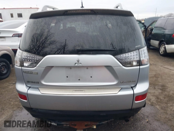 2009 Mitsubishi Outlander SE z VIN JA4MT31W89Z003101, wystawiony jako IAAI lot #41487678 z przebiegiem 90 226 mil mil oraz . Historia ofert i sprzedaży dostępna na DreamBid. Obrazek 16.