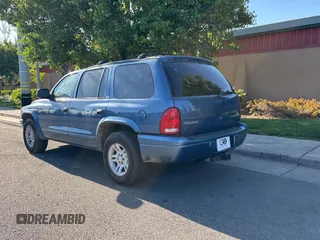 2002 Dodge Durango z VIN 1B4HR48N52F109342, wystawiony jako Copart lot #57185665 z przebiegiem 241 245 mil mil oraz Czysty tytuł • Clean title. Historia ofert i sprzedaży dostępna na DreamBid. Obrazek 3.