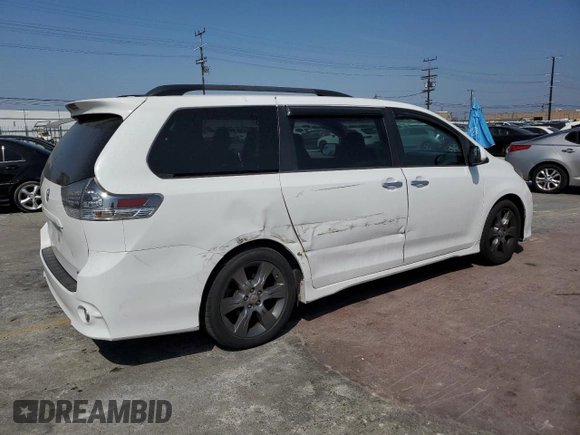 2015 Toyota Sienna SE with VIN 5TDXK3DC7FS601720, listed as a Copart auction lot 59959325 with 262,419 mi miles and Salvage title. Bid and sale history available at DreamBid. Image 3.