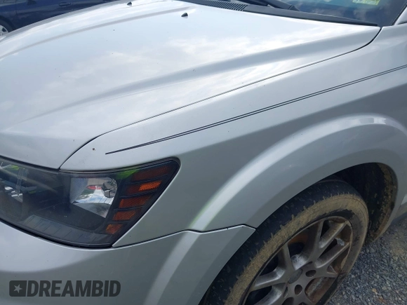 2014 Dodge Journey R/T with VIN 3C4PDDEG7ET139410, listed as a IAAI auction lot 42808542 with 185,712 mi miles and . Bid and sale history available at DreamBid. Image 16.