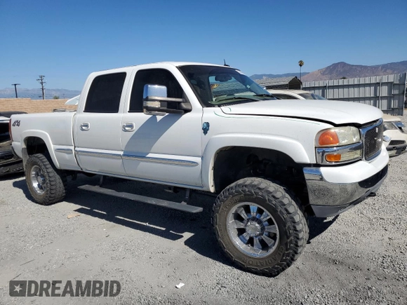 2002 GMC Sierra 1500HD SLE z VIN 1GTGK13U22F213058, wystawiony jako Copart lot #67418174 z przebiegiem 178 940 mil mil oraz Szkody całkowita. Historia ofert i sprzedaży dostępna na DreamBid. Obrazek 4.