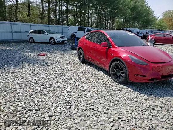 2021 Tesla Model Y Long Range z VIN 5YJYGDEE3MF189258, wystawiony jako Copart lot #54363615 z przebiegiem 56 315 mil mil oraz Szkoda całkowita • Salvage title. Historia ofert i sprzedaży dostępna na DreamBid. Obrazek 13.