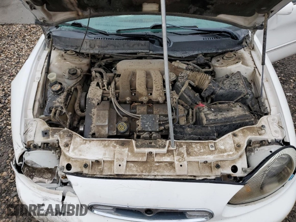 1997 Mercury Sable LS with VIN 1MELM53S2VG662056, listed as a Copart auction lot 71987484 with 150,280 mi miles and Salvage title. Bid and sale history available at DreamBid. Image 12.