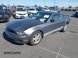 2012 Ford Mustang V6 Premium with VIN 1ZVBP8AM8C5265077, listed as a IAAI auction lot 41899887 with 139,915 mi miles. Bid and sale history available at carsss.com. Image 2.