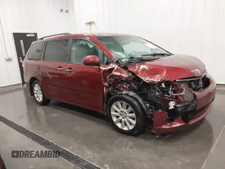 2014 Toyota Sienna Ltd with VIN 5TDDK3DC8ES079682, listed as a IAAI auction lot 41629201 with 172,717 mi miles. Bid and sale history available at carsss.com. Image 1.