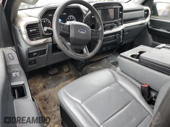 2021 Ford F-150 XL с VIN 1FTMF1E56MKE36985, выставлен на аукционе Copart как лот 55805335 с пробегом 49 618 миль миль и Списание • Salvage title. История ставок и продаж доступна на DreamBid. Изображение 8.