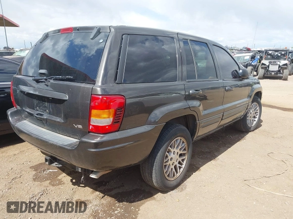 2004 Jeep Grand Cherokee Limited with VIN 1J8GX58NX4C422930, listed as a IAAI auction lot 41935711 with 223,844 mi miles and . Bid and sale history available at DreamBid. Image 4.
