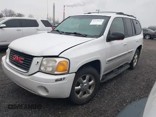 2003 GMC Envoy SLE with VIN 1GKDT13S732332171, listed as a IAAI auction lot 41520620 with 222,373 mi miles. Bid and sale history available at carsss.com. Image 2.