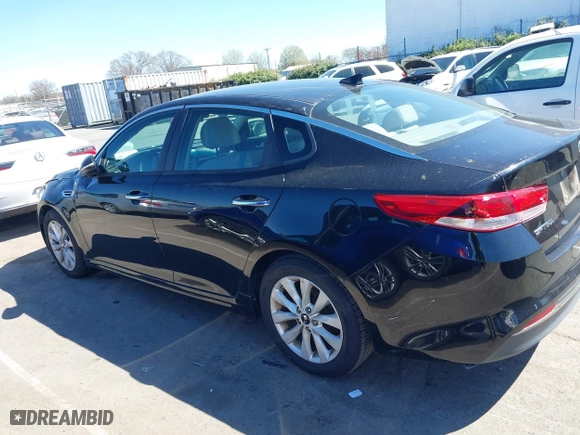 2016 Kia Optima LX with VIN 5XXGT4L3XGG013835, listed as a IAAI auction lot 41815349 with 120,628 mi miles. Bid and sale history available at carsss.com. Image 14.