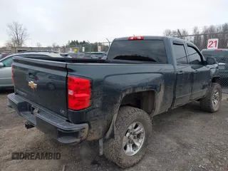 2019 Chevrolet Silverado 1500 LT with VIN 2GCVKPEC3K1181601, listed as a IAAI auction lot 41930872 with 59,106 mi miles and . Bid and sale history available at DreamBid. Image 4.