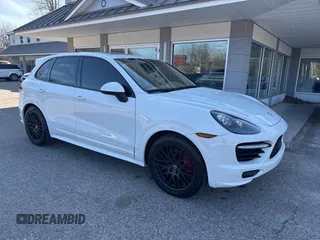 2013 Porsche Cayenne GTS with VIN WP1AD2A22DLA78738, listed as a IAAI auction lot 41816214 with 155,455 mi miles and . Bid and sale history available at DreamBid. Image 1.