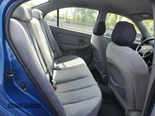 2005 Hyundai Elantra GLS z VIN KMHDN46D15U063723, wystawiony jako Copart lot #56113495 z przebiegiem 115 513 mil mil oraz Szkoda całkowita • Salvage title. Historia ofert i sprzedaży dostępna na DreamBid. Obrazek 10.