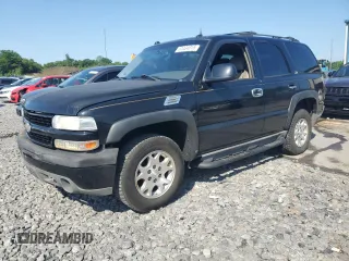 2004 Chevrolet Tahoe Z71 with VIN 1GNEK13Z74R137672, listed as a Copart auction lot 61434015 with 155,401 mi miles and Salvage title. Bid and sale history available at DreamBid. Image 1.