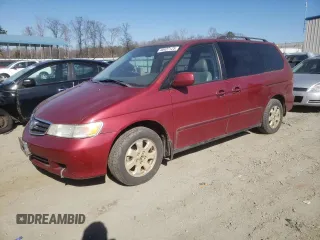 2003 Honda Odyssey EX-L with VIN 5FNRL189X3B006613, listed as a Copart auction lot 46427125 with 245,477 mi miles and Salvage Title. Bid and sale history available at DreamBid. Image 1.